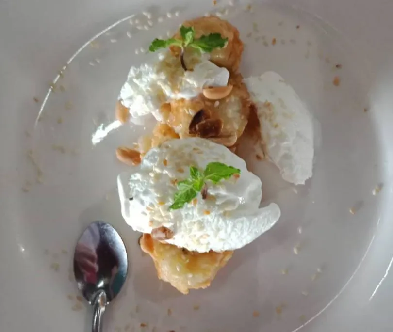 Banana fritter with coconut cream