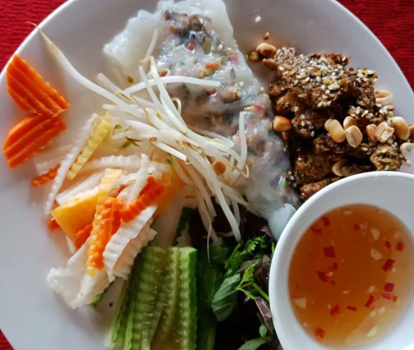 Fresh Rice Pastry rolling with Pork Mince and Mushrooms serve with BBQ Pork  Banh Cuon thit Nuong
