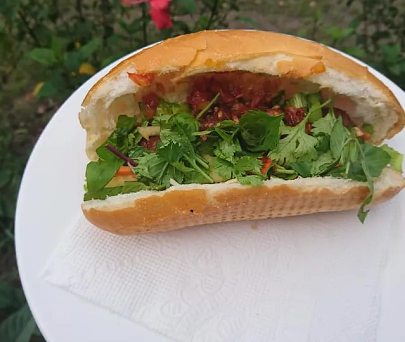 Vietnamese Baguette with pork ball and tomato sauce
