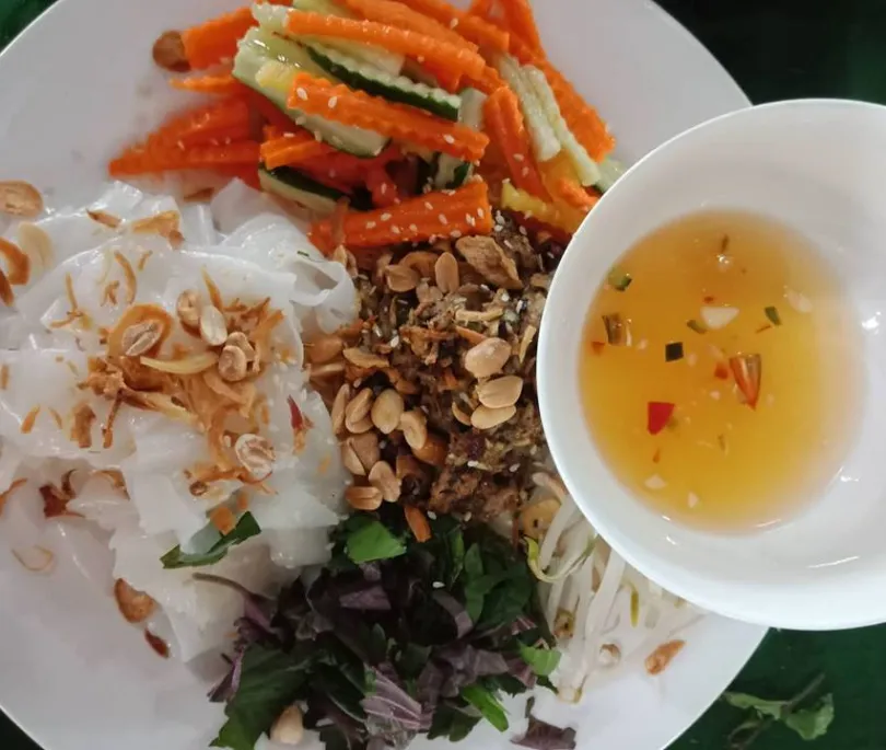 Wet Noodle with BBQ Pork serve with sweet and sour sauce banh uot thit Nuong