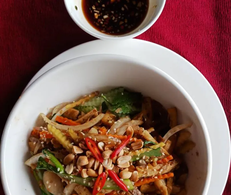 Stir Fry Vegetables with ginger ,lemongrass on fresh rice noodle