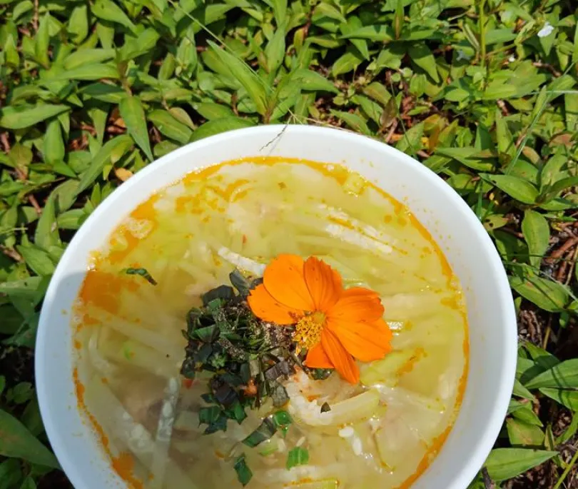 Squash soup with fresh prawn