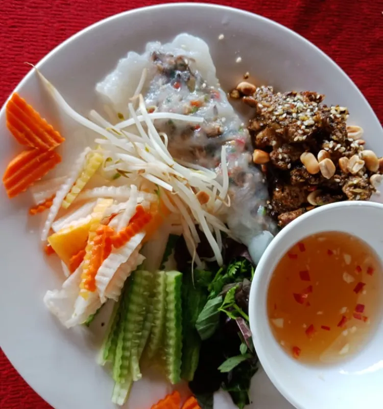 Fresh Rice Pastry rolling with Pork Mince and Mushrooms serve with BBQ Pork  Banh Cuon thit Nuong