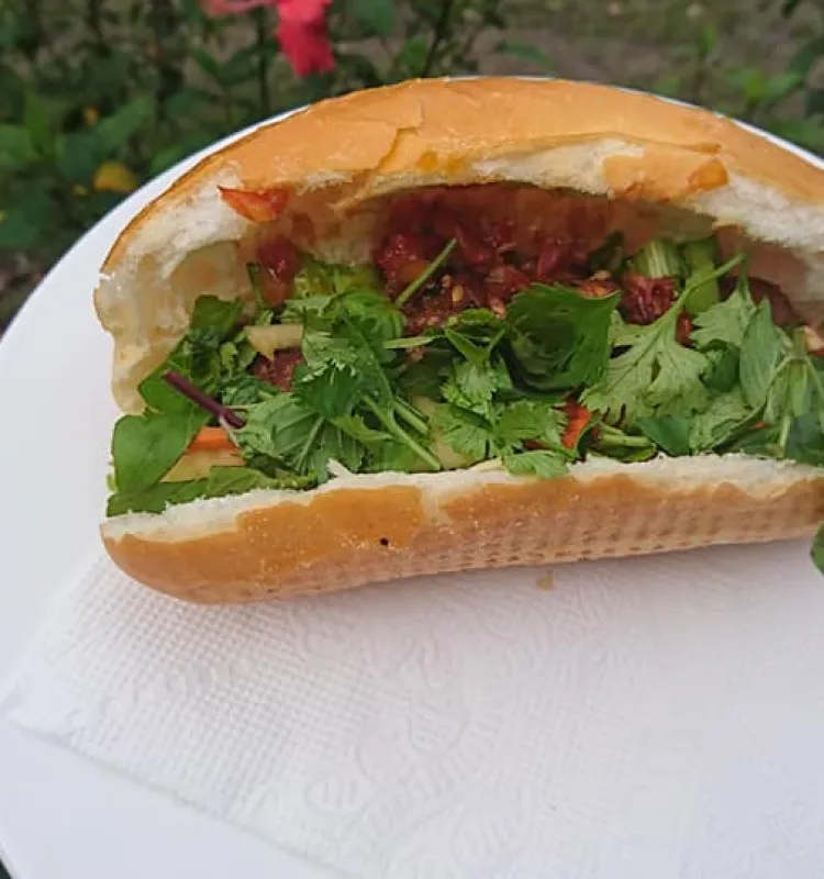 Vietnamese Baguette with pork ball and tomato sauce
