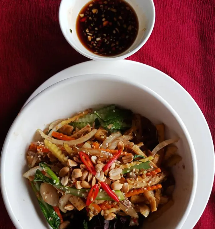 Stir Fry Vegetables with ginger ,lemongrass on fresh rice noodle