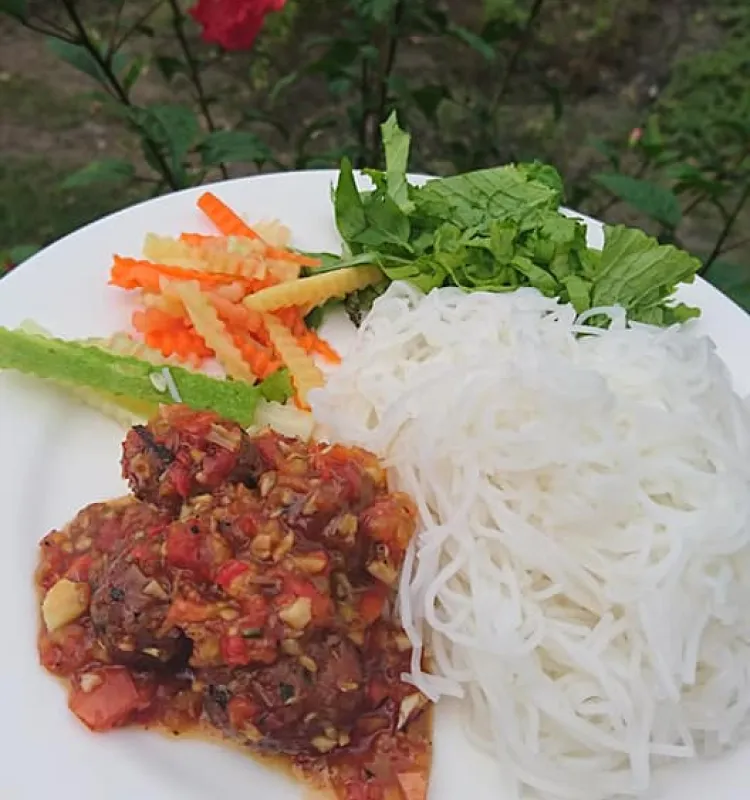Fresh rice Noodle  with pork ball and tomato sauce