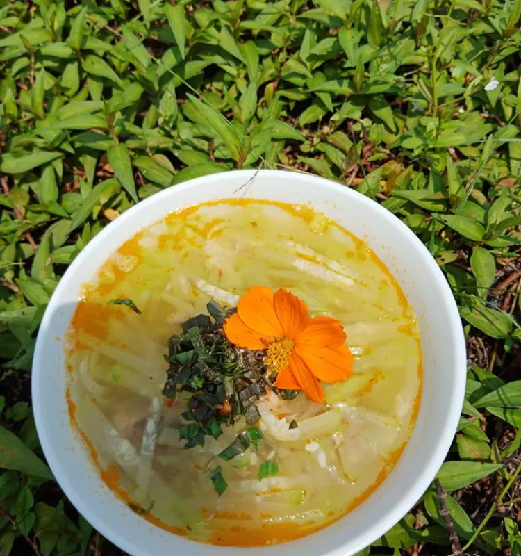 Squash soup with fresh prawn